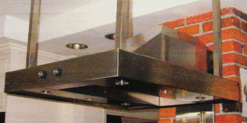 Custom-designed and fabricated stainless steel residential kitchen hood.